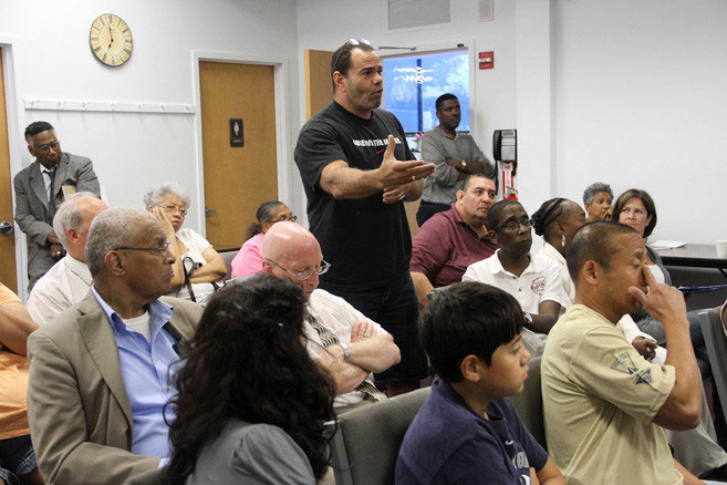 Copyright LIHerald.com Dino Delaney spoke about the Malverne school district’s turbulent racial history at a community forum where area residents discussed a potential Lakeview charter school.