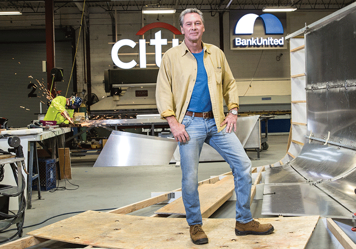 Jeff Peterson is king of the business sign industry in New York. He started out in a small auto shop and make it to the Barclay's Center and beyond. Courtesy Long Island Pulse.